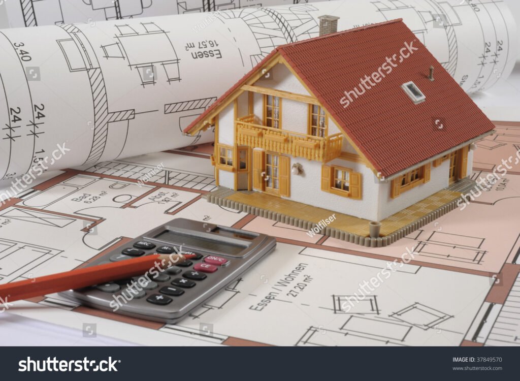 plans architecturaux avec calculatrice et modele maison